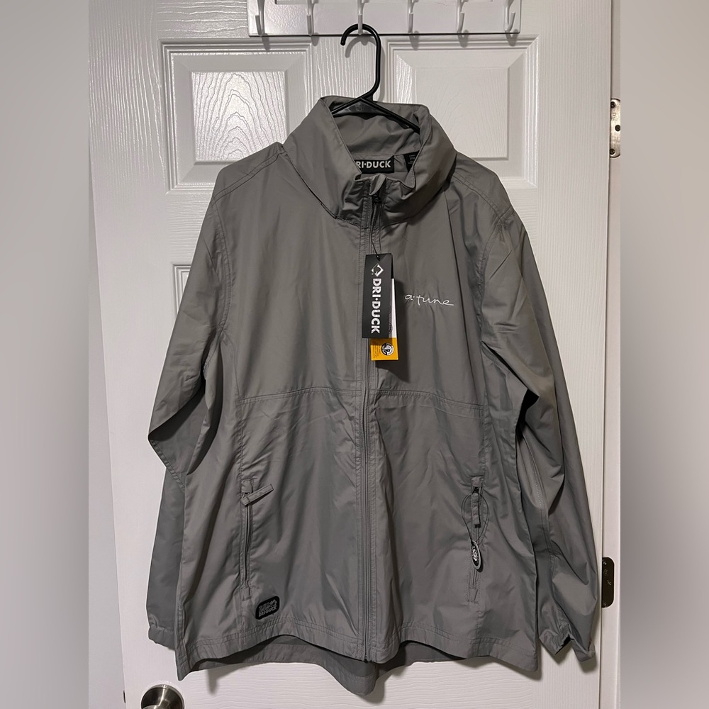 NWT women’s windbreaker with hidden hood